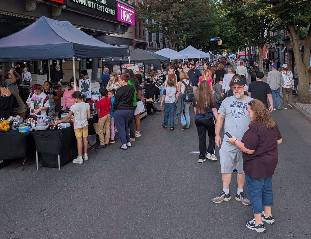 Vendor Booths from Williamsport First Friday 2025 with vendors and crowds