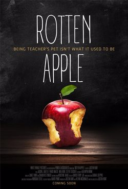 POSTER FOR THE FILM ROTTEN APPLE, BLACK CHALKBOARD BACKGROUND WITH THE FILM'S TITLE AND THE TAGLINE BEING TEACHER'S PET ISN'T WHAT IT USED TO BE. WITH A ROTTING APPLE WITH TWO BITES OUT OF IT AT THE BOTTOM.